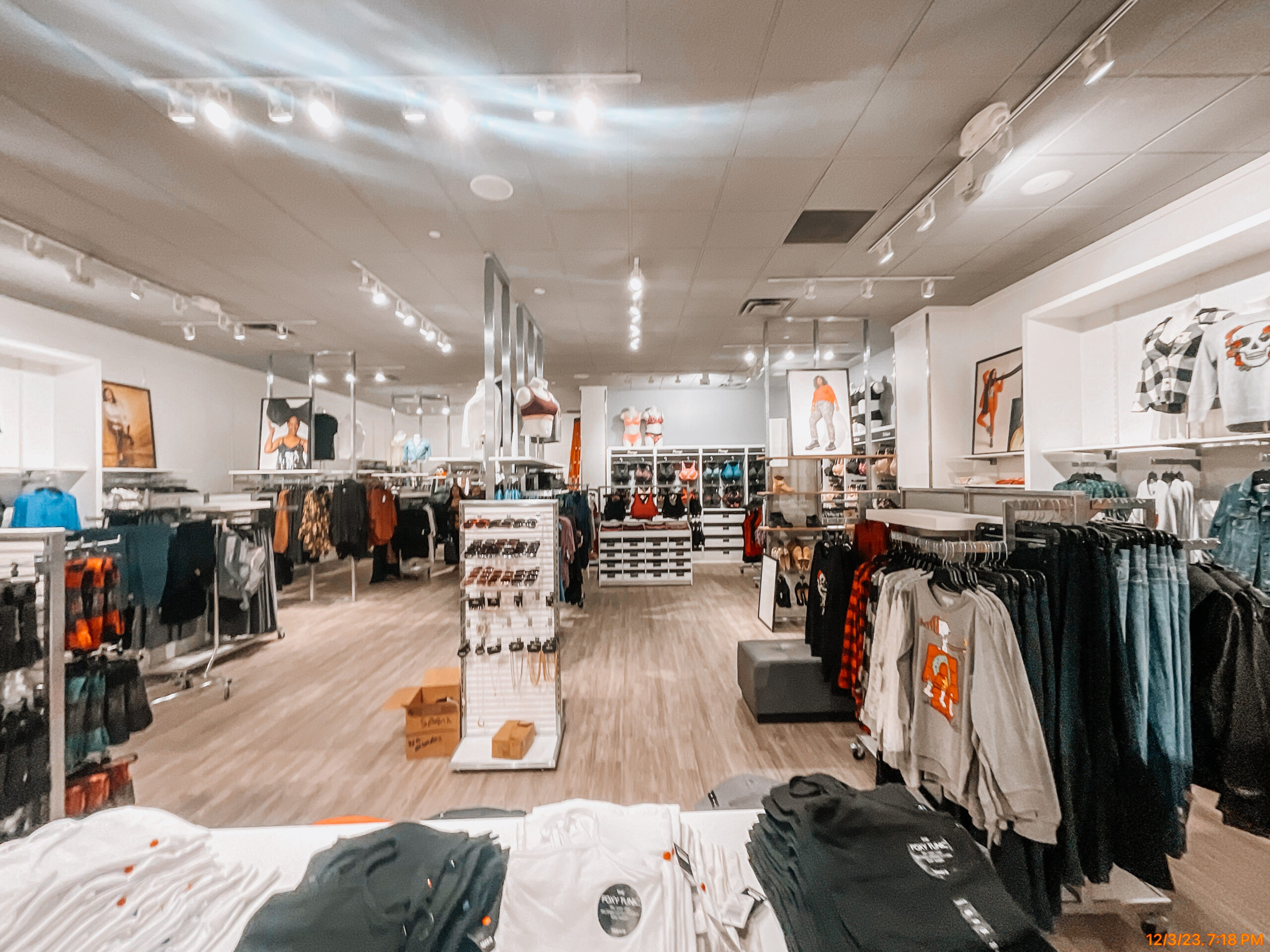 Torrid store dressing rooms with lighting installed by Synergy Commercial Construction
