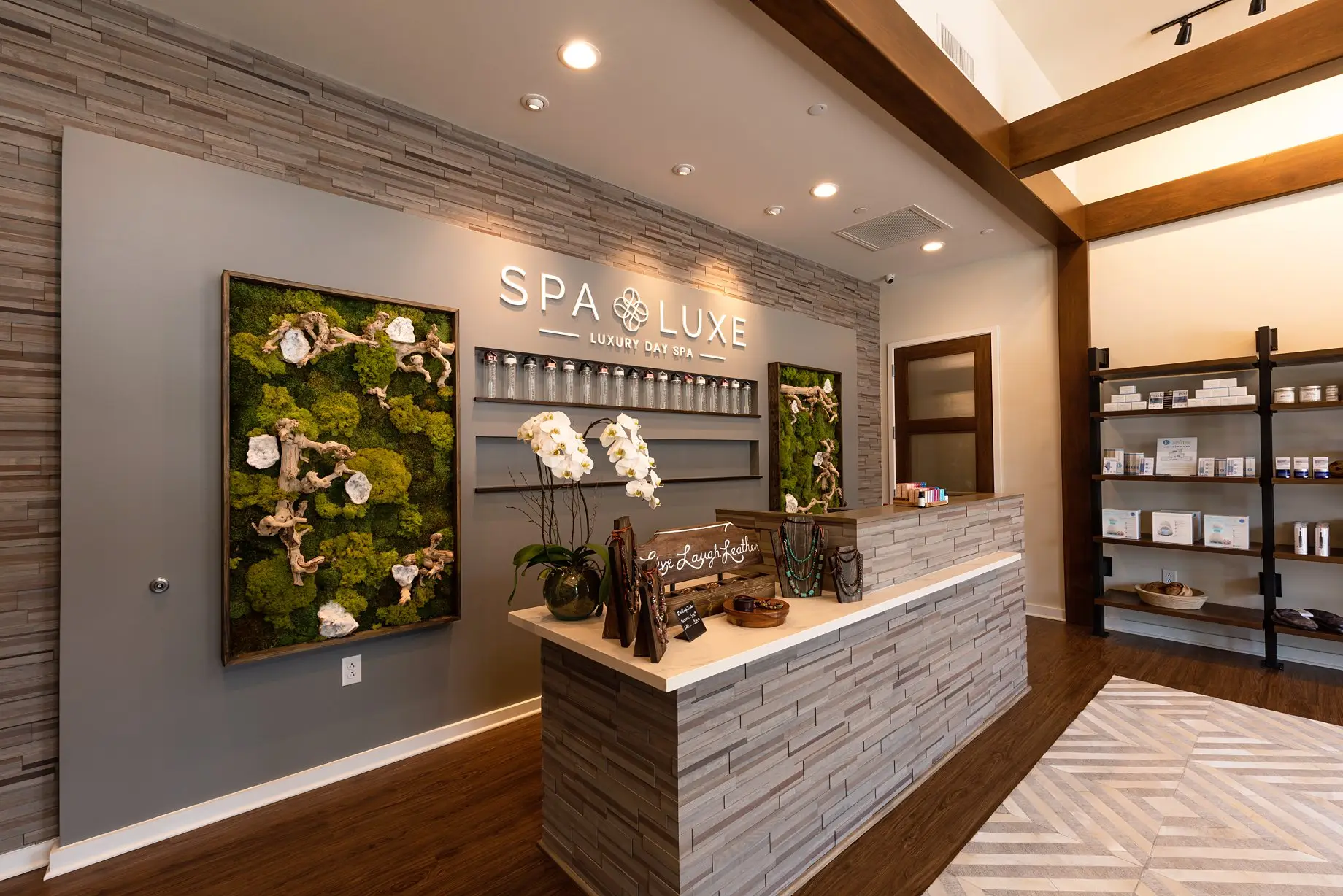Custom reception desk and interior finishes at Spa Luxe by Synergy Commercial Construction